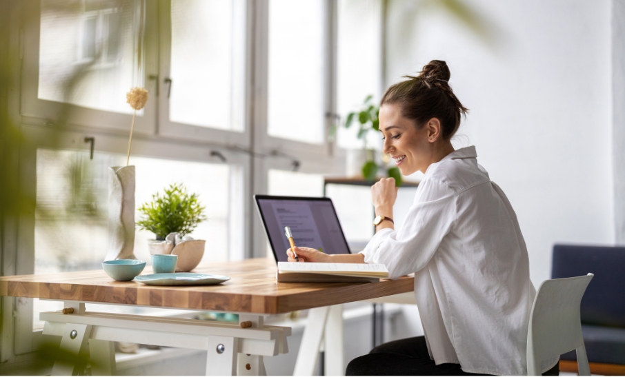 Woman completing her Swiss tax return at a sunlit desk